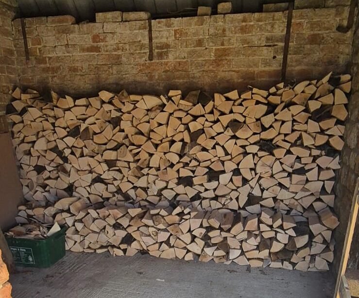 2 cubic metres of kiln dried logs stacked